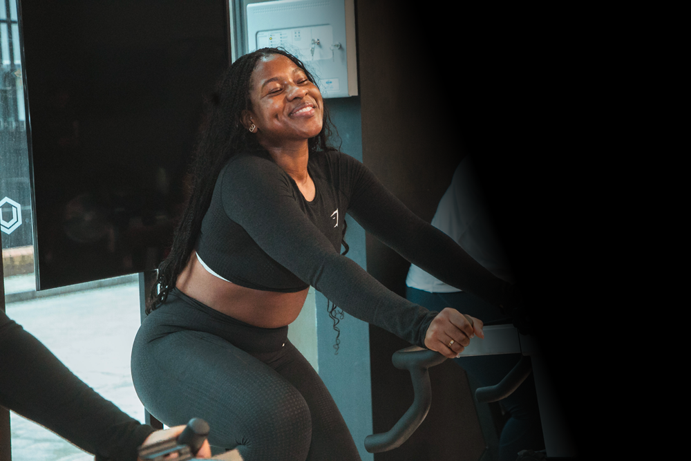 The coach is working out with smile.